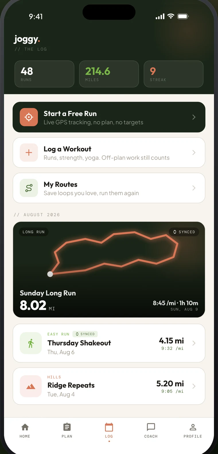 The Log tab in joggy: 48 runs, 214.6 miles and a 9-day streak, above a Sunday long run with its route traced out
